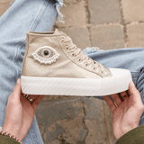 BASKETS MONTANTES DORÉES FEMME DÉTAIL OEIL PERLÉ - Casualmode.fr